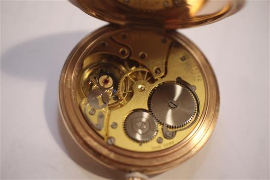 A George V 9ct gold pocket watch, with an 18ct gold albert with half sovereign fob and watch key.	